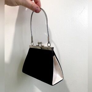 World most tiny black hand bag